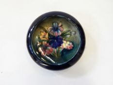 A Moorcroft small pottery bowl with inverted border,