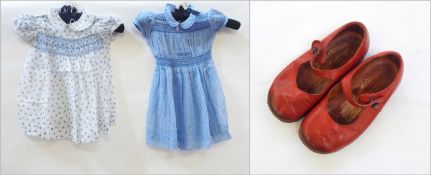 Various little girl's dresses in poplin with smocking and others,