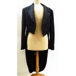 A gentleman's black wool tail coat