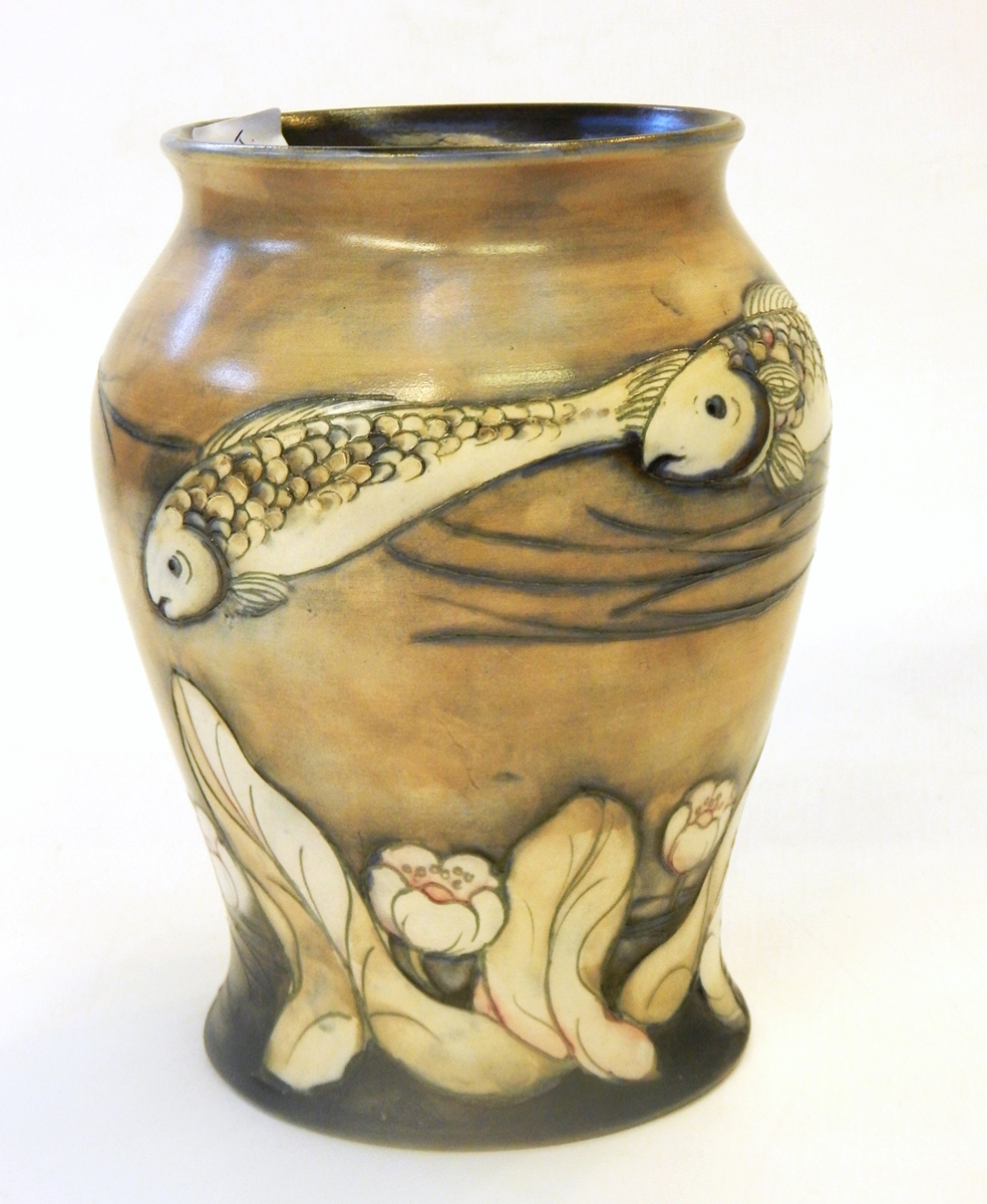 A Moorcroft vase of baluster form, decorated with a continuous band of fish, water lilies beneath,