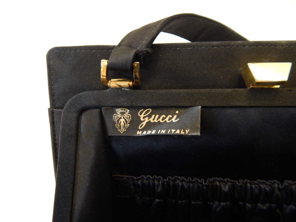 A satin evening bag with gilt fittings, bearing label inside "Gucci made in Italy", - Image 2 of 2