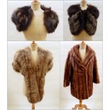 Two fox fur capes,