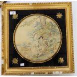 A Victorian silk embroidery depicting a couple in a pastoral scene beneath a tree,