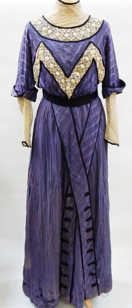 An early Victorian walking dress in purple silk, lace inset sleeves, - Image 2 of 2