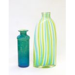 A Mdina glass vase of cylindrical form with flared rim, decorated with veins of green and yellow,