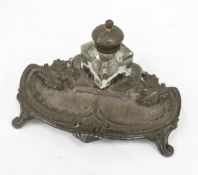 Art Nouveau style silver plated inkstand, the square inkwell set at an angle, hinged lid (loose),