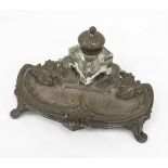 Art Nouveau style silver plated inkstand, the square inkwell set at an angle, hinged lid (loose),