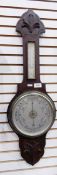 A drop-down wall barometer, thermometer in case to top farenheit and centigrade,