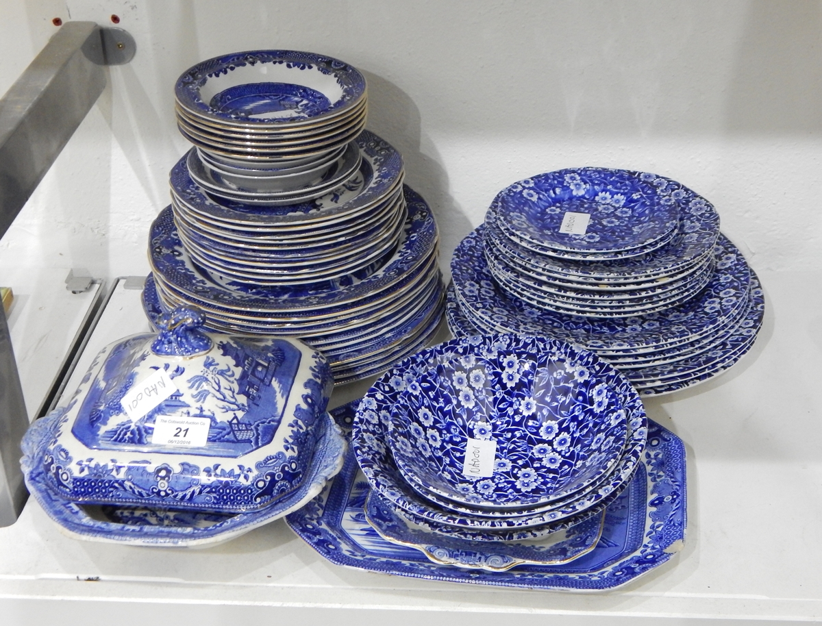 A quantity of blue and white tableware including Burleighware 'Willow' and 'Calico' pattern