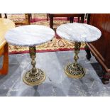 A pair of circular marble top wine tables on pierced brass pedestals (2)