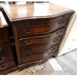 A 20th century mahogany veneered and cross-banded serpentine-fronted chest of four drawers on