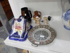 A Victorian plate with pewter warming stand, a pair of candlesticks with pink and gilt decoration,