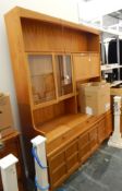 An Ercol teak side unit with glass display cabinet,