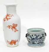 A Chinese porcelain vase of baluster form with iron red decoration including emblems of carp,