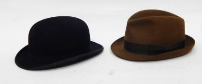 A collection of bowler and trilby hats