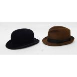 A collection of bowler and trilby hats