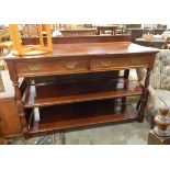 A late 19th century mahogany buffet fitted two drawers to frieze and with two open shelves,