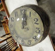 An Art Nouveau copper and brass wall clock with Arabic numerals, embossed floral decoration to edge,