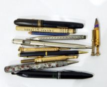 A collection of pens and pencils including a Swan self filler fountain by Mabie Todd & Co Ltd in