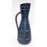 An Austrian pottery ewer decorated with geometric pattern in grey and blue,