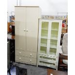 A modern white finish two-door wardrobe fitted two drawers and a white painted cabinet enclosed by