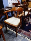 A pair of oak framed tub chairs (2)