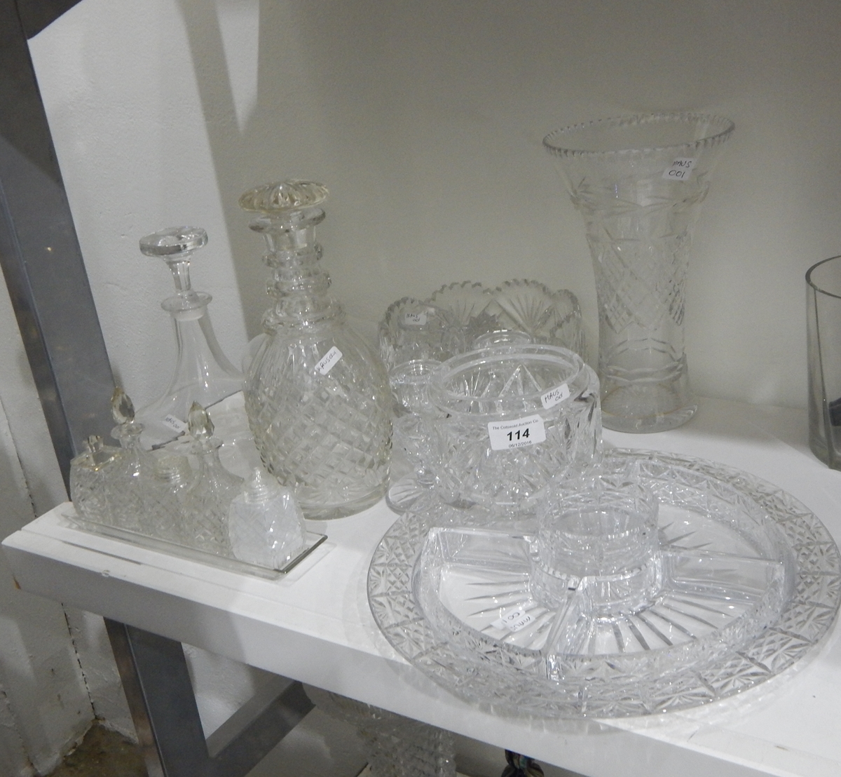 A pair of glass ship's decanters, a cut glass vase of flared form,