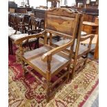 A pair of craft made walnut(?) open arm elbow chairs with solid seat and turned stretchers (2)