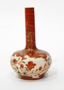 A small Satsuma vase of bottle form, decorated with flowers,