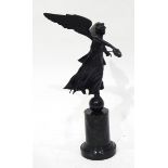 A bronze figure of Victory, the winged female figure holding a wreath,