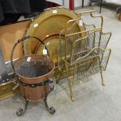 A quantity of copper and brassware to include: fire curb, coal bucket, magazine rack, trays etc.