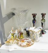 A pair of glass candlesticks of multi-coloured twisted baluster form, 24cm high,