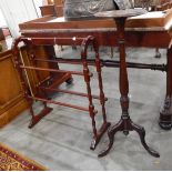 A mahogany torchere raised on turned column and tripod supports and a stained as mahogany towel