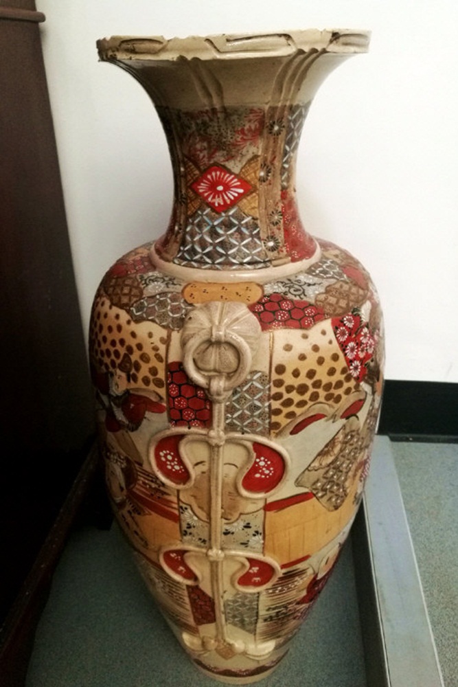 A Japanese Satsuma earthenware floor vase with typical decoration, ovoid,