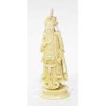 A Chinese carved ivory chess piece of a Samurai warrier (some damage to head dress),