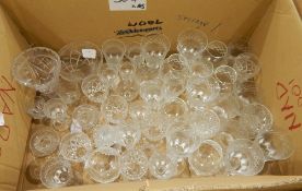 A large quantity of cut glass and other glassware including wines, sherries, bowls, vases, etc.