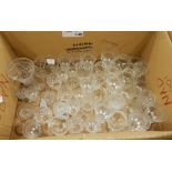 A large quantity of cut glass and other glassware including wines, sherries, bowls, vases, etc.