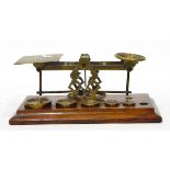 A Victorian set of brass postal scales by S Morden & Co, London,