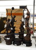 Four bronzed effect spelter figures of maidens depicting Enlightenment and Learning on turned