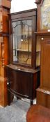 A mahogany glazed display cupboard,