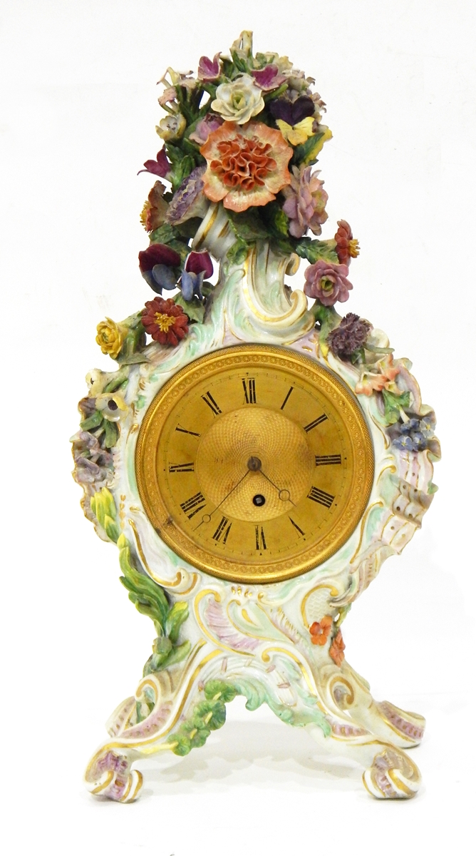 A continental Meissen style porcelain mantel clock,