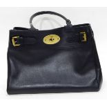 A Mulberry black leather handbag with buckle detail, the interior fitted with a zip pocket, approx.