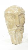 An African carved hardwood female bust, 14cm, a soft stone bust of a bearded man,