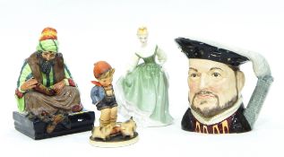 A Royal Doulton model 'Cobbler' HN1706, a Royal Doulton character jug of Henry VIII,