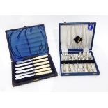 A cased set of silver plated dessert spoons and forks,