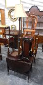 An oak drop-leaf tea trolley, a cane seated bentwood chair, three cane seated dressing stools,