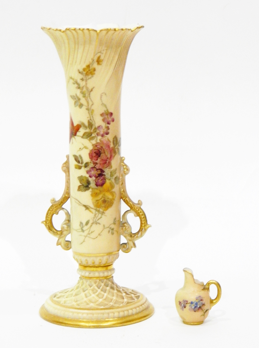 A Royal Worcester miniature jug painted with flowers on an ivory ground,