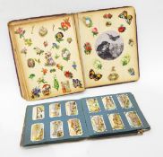 A late Victorian scrapbook, an album of cigarette cards, various, a German 100,000 Mark bank note,