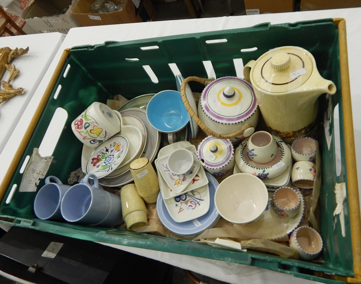 A quantity of Poole including biscuit barrel, egg cups, dishes, cups and saucers, etc.