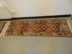 A pair of modern 20th century wool runners with geometric pattern,